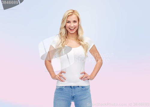 Image of happy young woman or teenage girl in white t-shirt