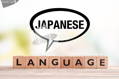 Image of Japanese language lesson sign on a table