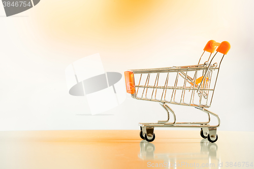 Image of Shopping cart in orange environment