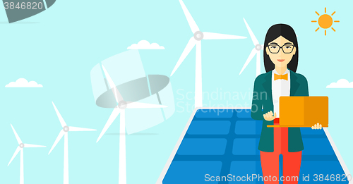 Image of Woman using laptop.