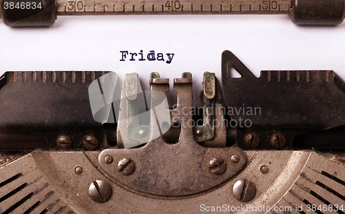 Image of Friday typography on a vintage typewriter