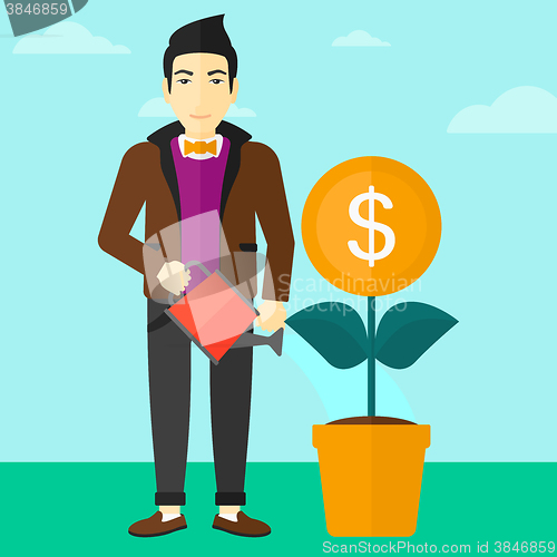 Image of Man watering money flower.