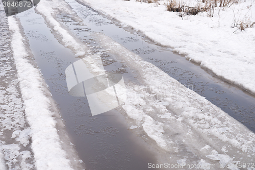 Image of spring road with snow