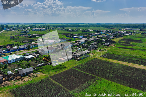 Image of Novikovo village and fields set with potato