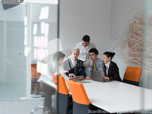 Image of business people group on meeting at modern startup office