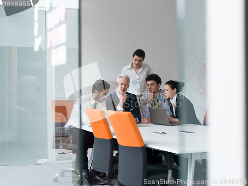 Image of business people group on meeting at modern startup office