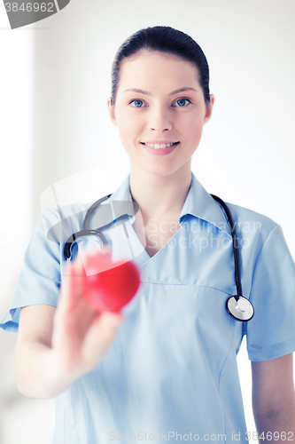 Image of female doctor with heart