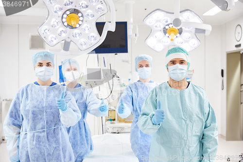 Image of group of surgeons in operating room at hospital