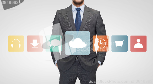 Image of close up of businessman in suit with menu icons