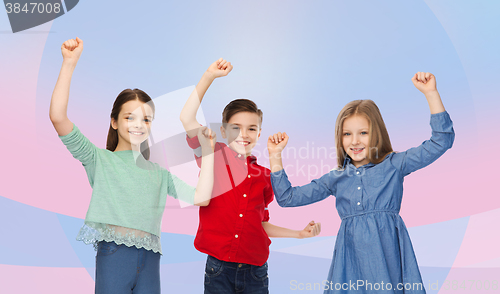 Image of happy boy and girls celebrating victory