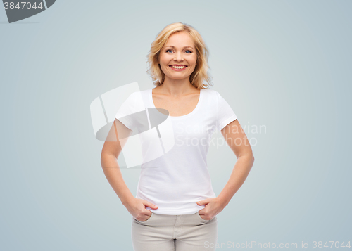 Image of smiling woman in blank white t-shirt