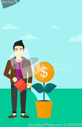 Image of Man watering money flower.