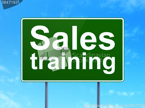 Image of Marketing concept: Sales Training on road sign background