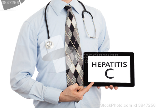 Image of Doctor holding tablet - Hepatitis C