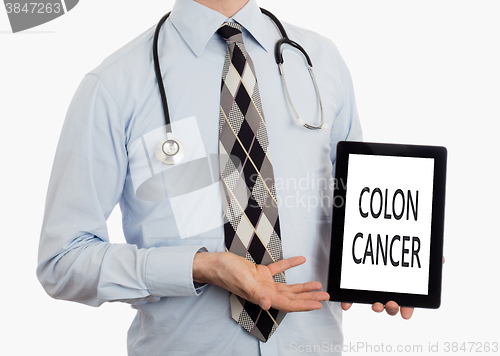 Image of Doctor holding tablet - Colon cancer