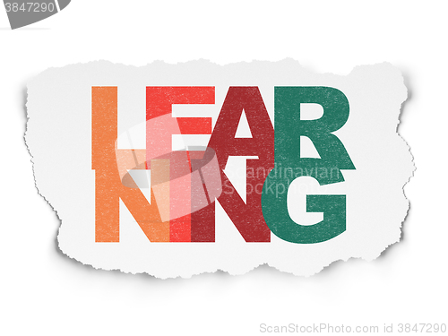 Image of Education concept: Learning on Torn Paper background