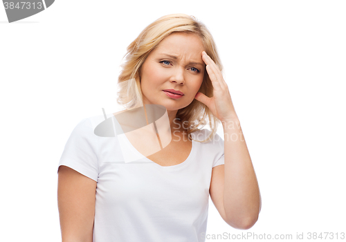 Image of unhappy woman suffering from headache