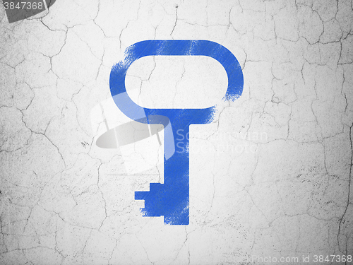 Image of Security concept: Key on wall background