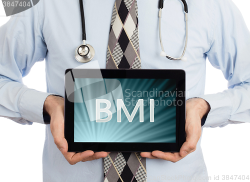 Image of Doctor holding tablet - BMI