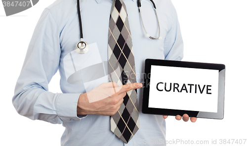 Image of Doctor holding tablet - Curative
