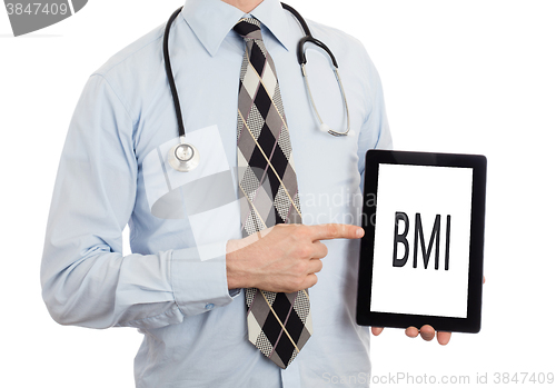 Image of Doctor holding tablet - BMI