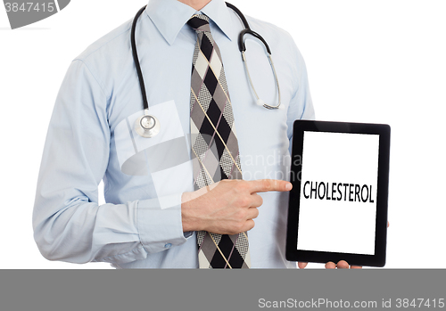 Image of Doctor holding tablet - Cholesterol