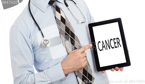 Image of Doctor holding tablet - Cancer