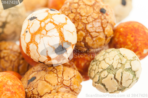 Image of Japanese sweets beans (nuts) with colored sugar coat,