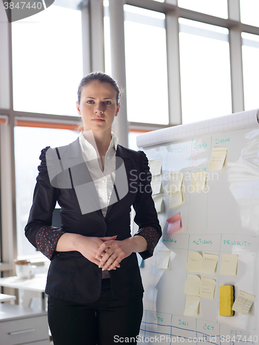 Image of portrait of young business woman at modern office