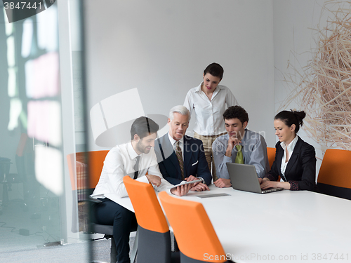 Image of business people group on meeting at modern startup office