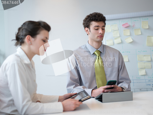 Image of group of young business people  on meeting at modern startup off