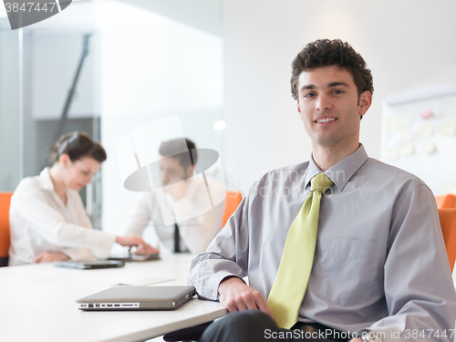 Image of group of young business people  on meeting at modern startup off