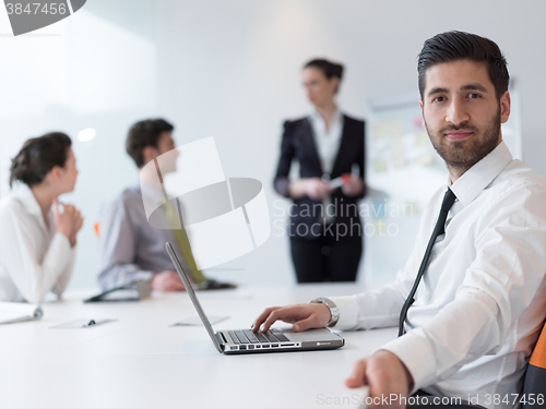 Image of portrait of young modern arab business man  at office