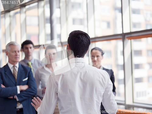 Image of business leader making presentation and brainstorming