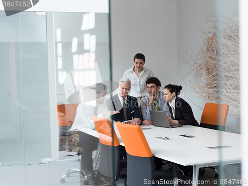 Image of business people group on meeting at modern startup office