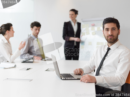 Image of portrait of young modern arab business man  at office