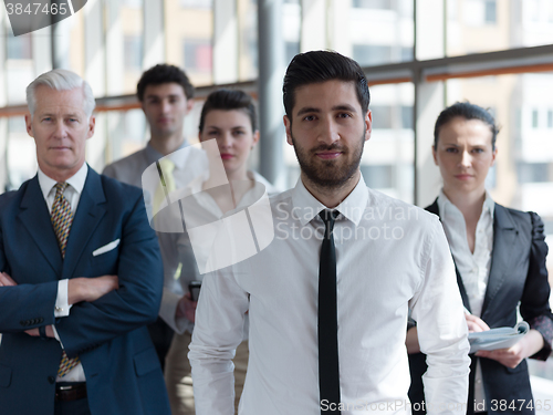 Image of portrait of business people group at modern office
