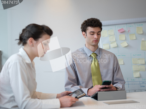 Image of group of young business people  on meeting at modern startup off