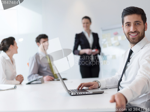 Image of portrait of young modern arab business man  at office