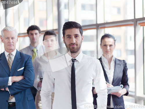 Image of portrait of business people group at modern office