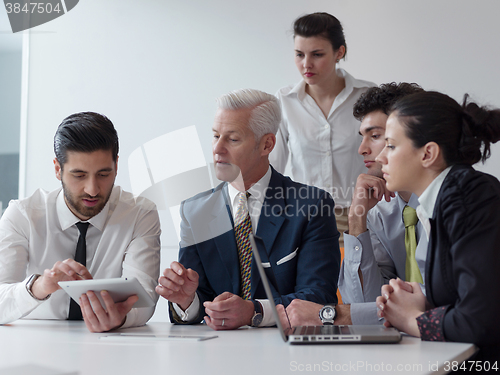 Image of business people group on meeting at modern startup office
