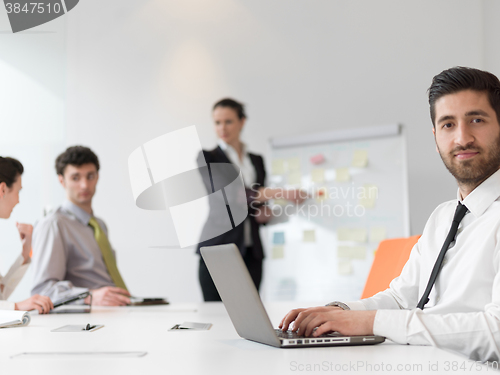 Image of portrait of young modern arab business man  at office