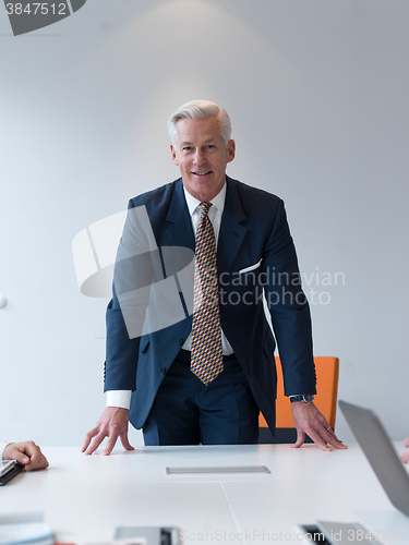 Image of confident and handsome  senior business man