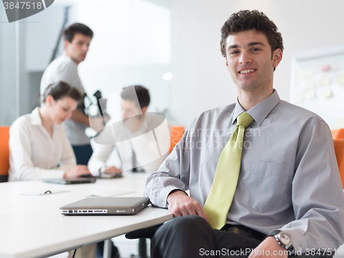Image of group of young business people  on meeting at modern startup off