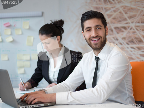 Image of portrait of young modern arab business man  at office