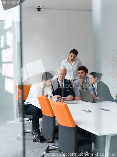 Image of business people group on meeting at modern startup office