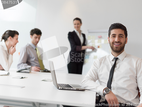 Image of portrait of young modern arab business man  at office
