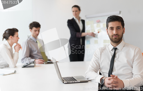 Image of portrait of young modern arab business man  at office