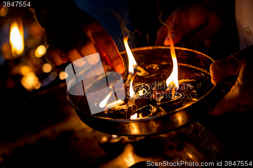 Image of Burning candles in the Indian temple.