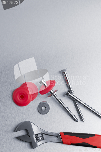 Image of Spanner tool and screws